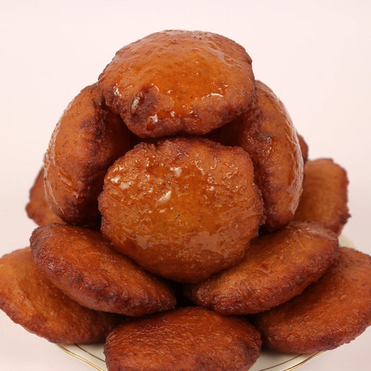 Traditional kobbari burelu sweet filled with coconut and jaggery stuffing.