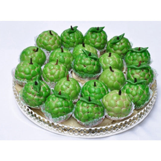 Handcrafted green Cashew Seetafal (Kaju Sitaphal) sweets shaped like custard apples, prepared by Athithi Gruha Foods.